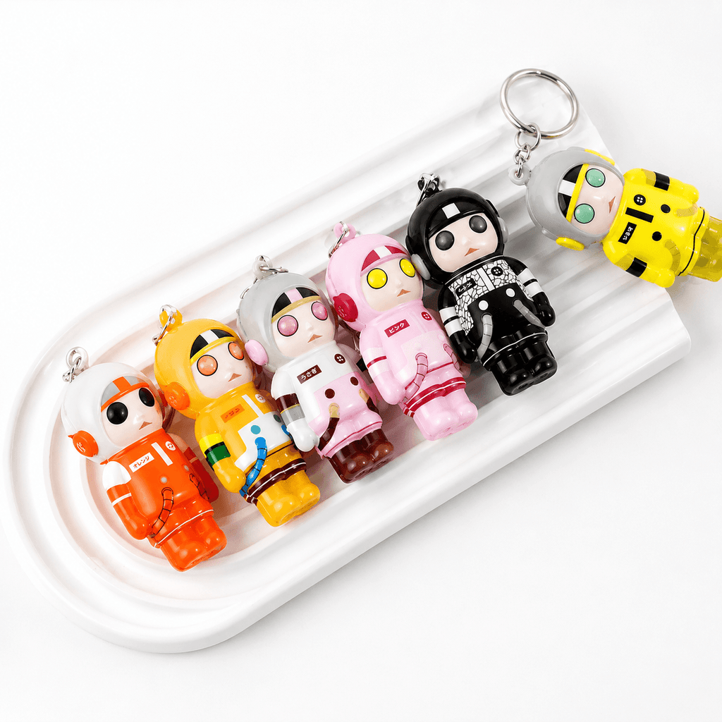 Porte-clés Squishy Astronaute Kawaii souples et agréables à presser, parfaits pour sacs et clés.