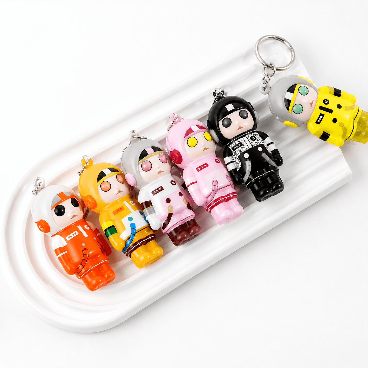 Porte-clés Squishy Astronaute Kawaii souples et agréables à presser, parfaits pour sacs et clés.