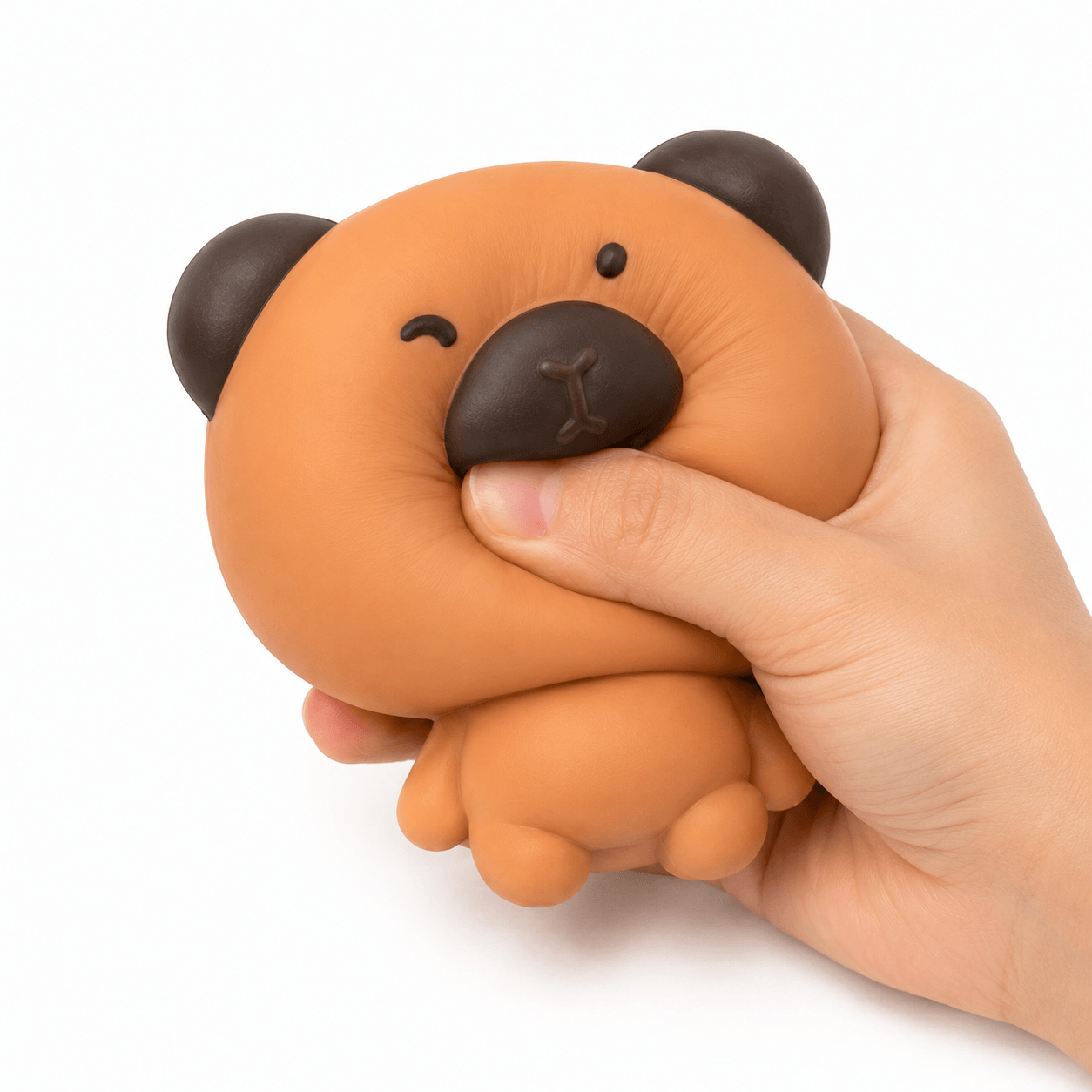 Main pressant un Squishy Capybara Kawaii Anti-Stress à texture ultra douce et effet slow rising.