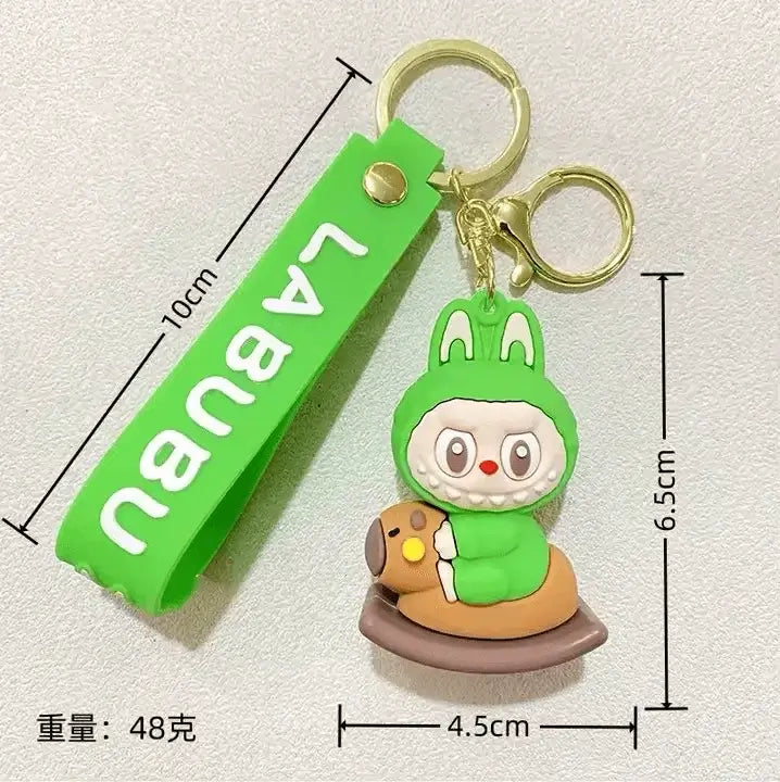 Porte-clés Labubu vert kawaii avec personnage collector, accessoire original pour sacs et trousses.