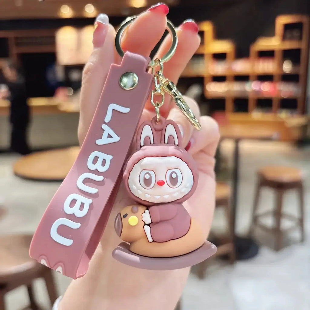 Porte-clés Labubu rose kawaii avec personnage adorable, parfait comme cadeau ou accessoire de mode.
