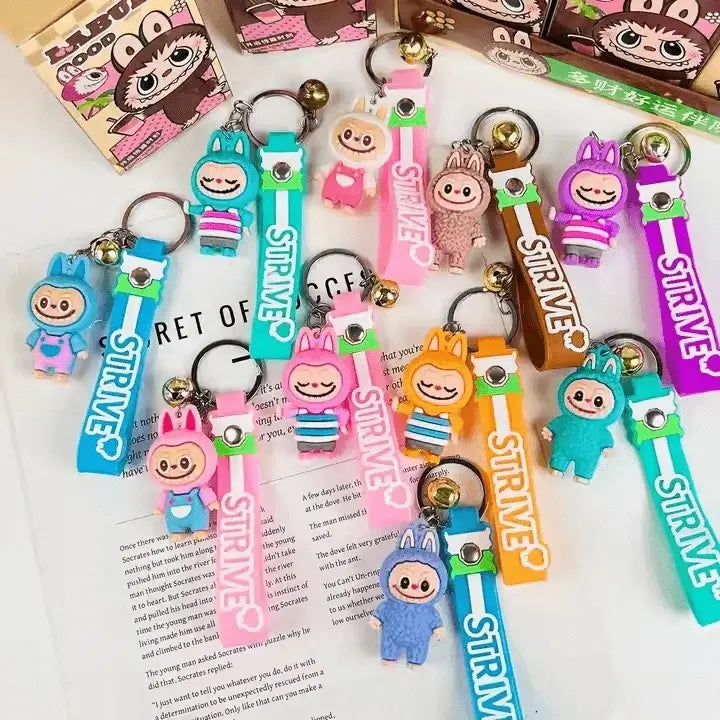 Porte-clés Labubu multicolores kawaii avec différents personnages colorés et adorables.